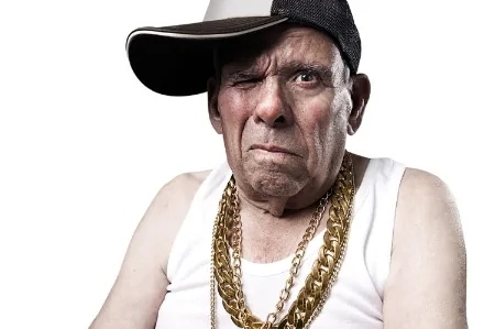 old man wearing gold chain.webp