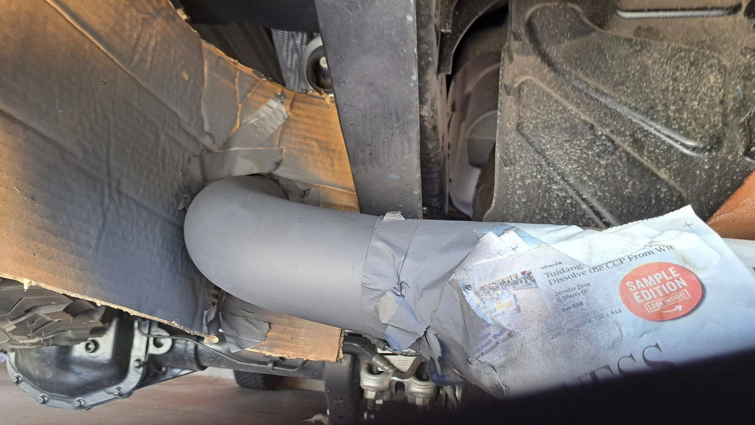Masked and re-painted tailpipe.jpg