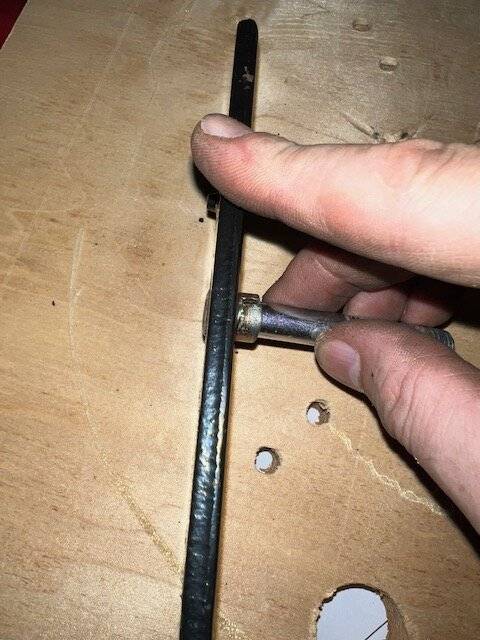 Made spacer next to factory shim.jpg