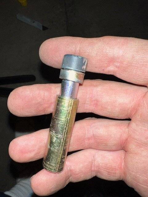 In hand bolt and spacer.jpg