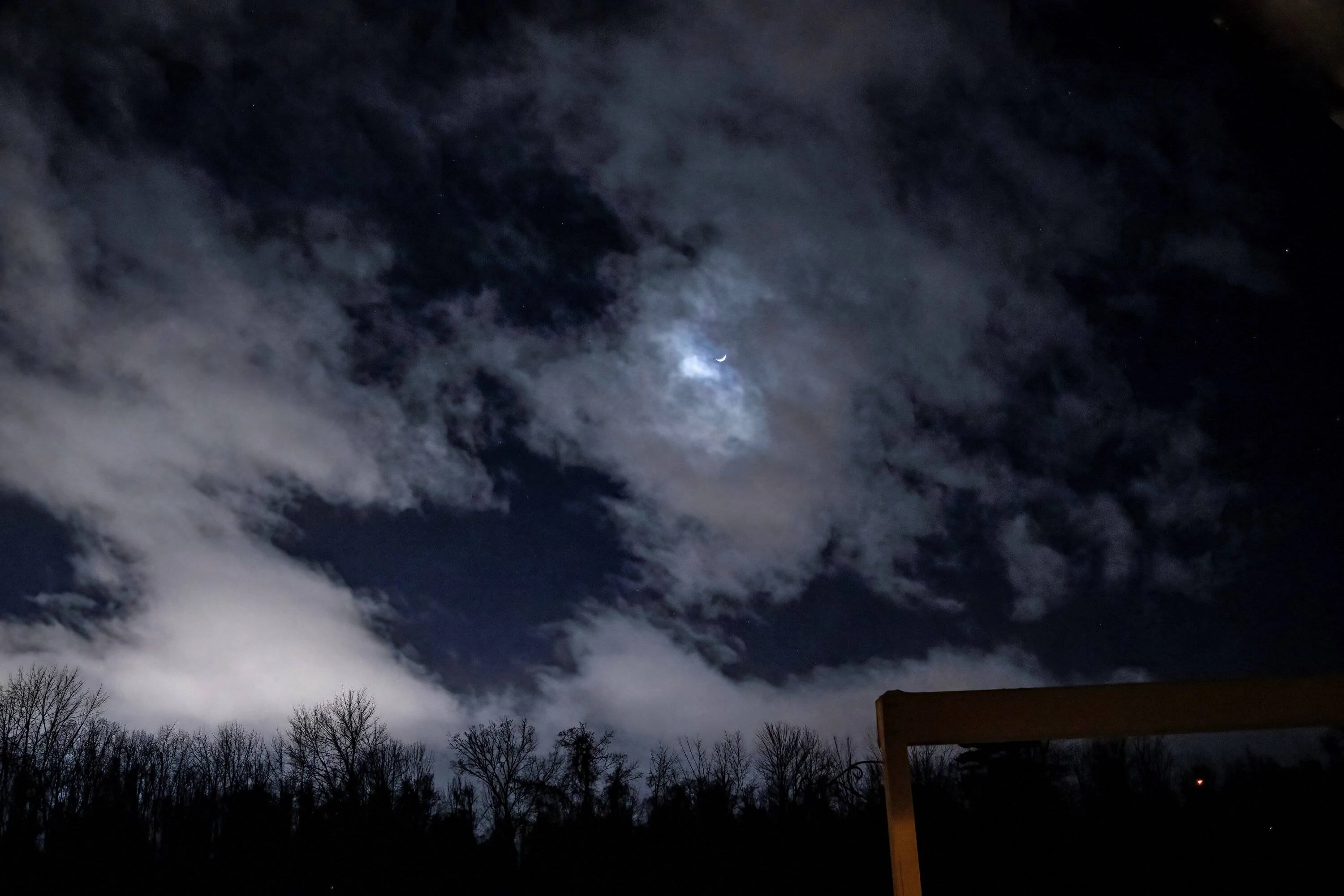 moon in the clouds 2.24.23 wide angle small.webp