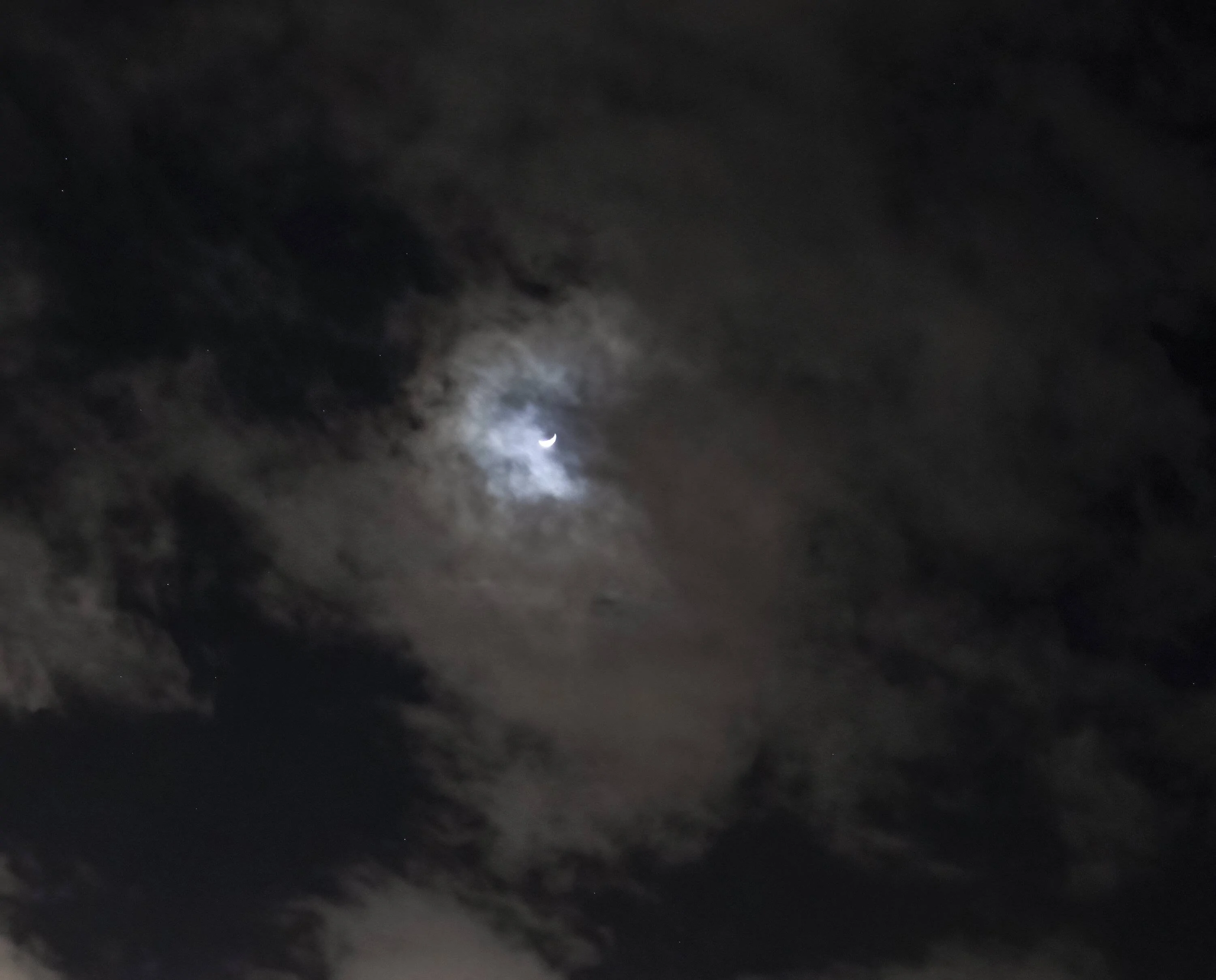 moon in the clouds 2.24.23.webp