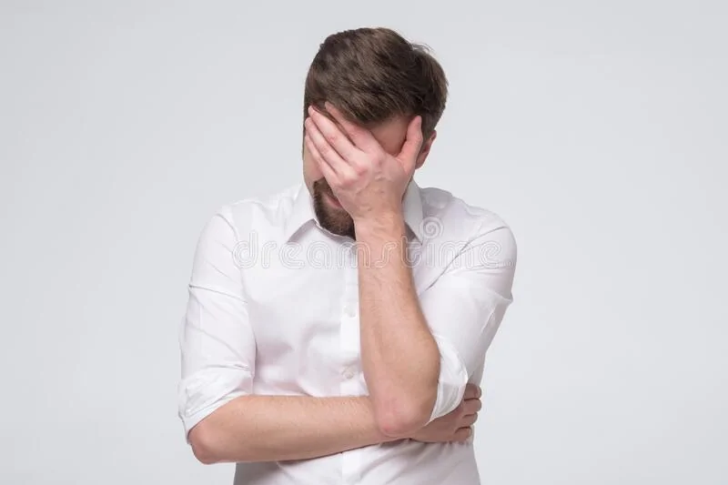 facepalm-disappointed-man-covering-his-face-his-hand-white-background-facepalm-disappointed-m...webp