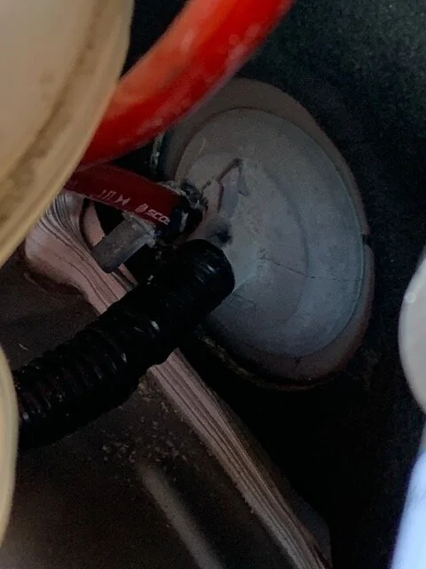 Amp wire under hood pass side.webp