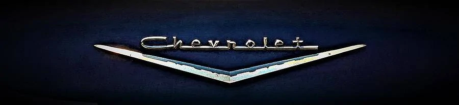 1957-chevrolet-bel-air-hood-emblem-elizabeth-pennington.webp