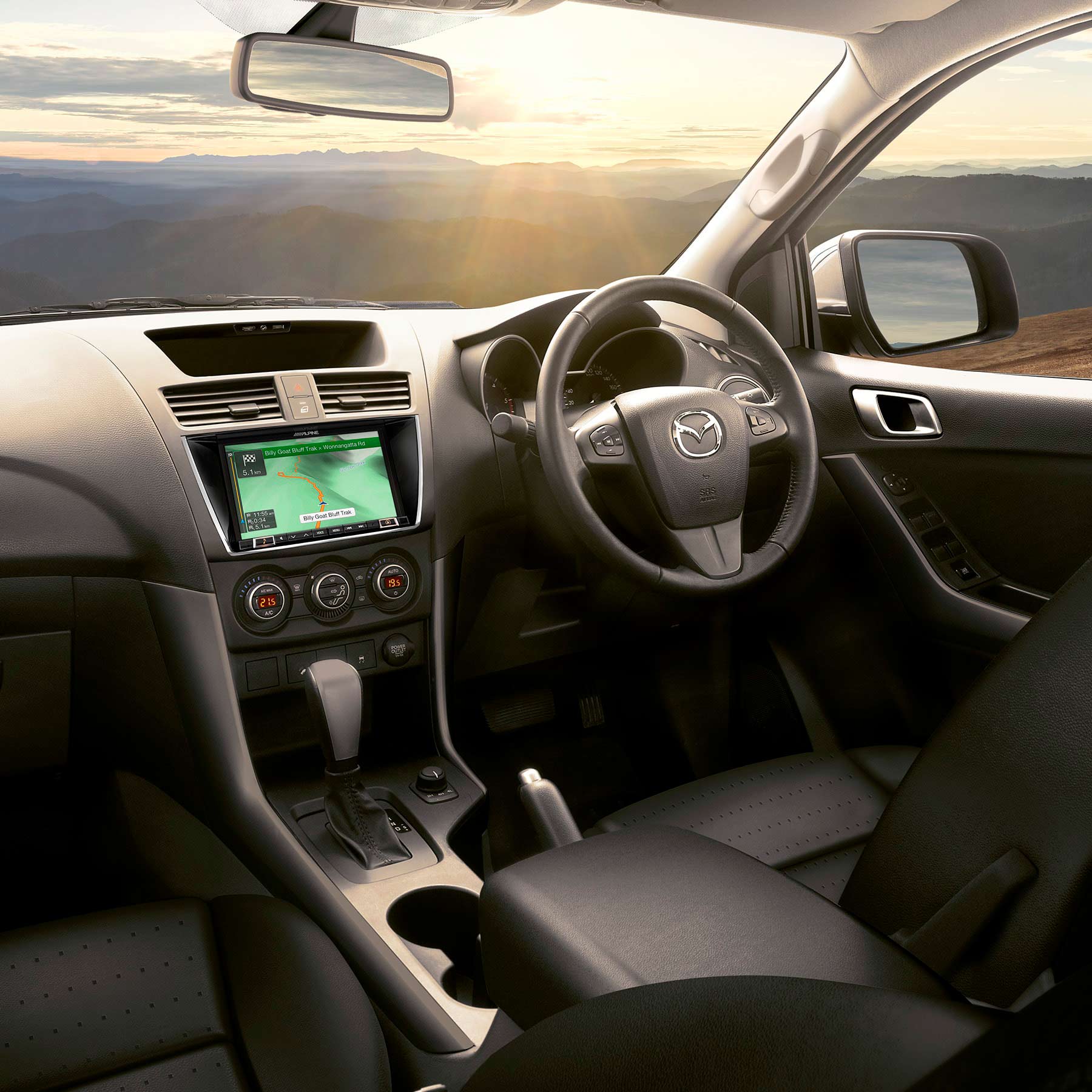bt-50_4x4_dual_cab_utility_gt_interior_front3-4_mountain_sunshine_ipm2018_vlp-3566644179.jpg