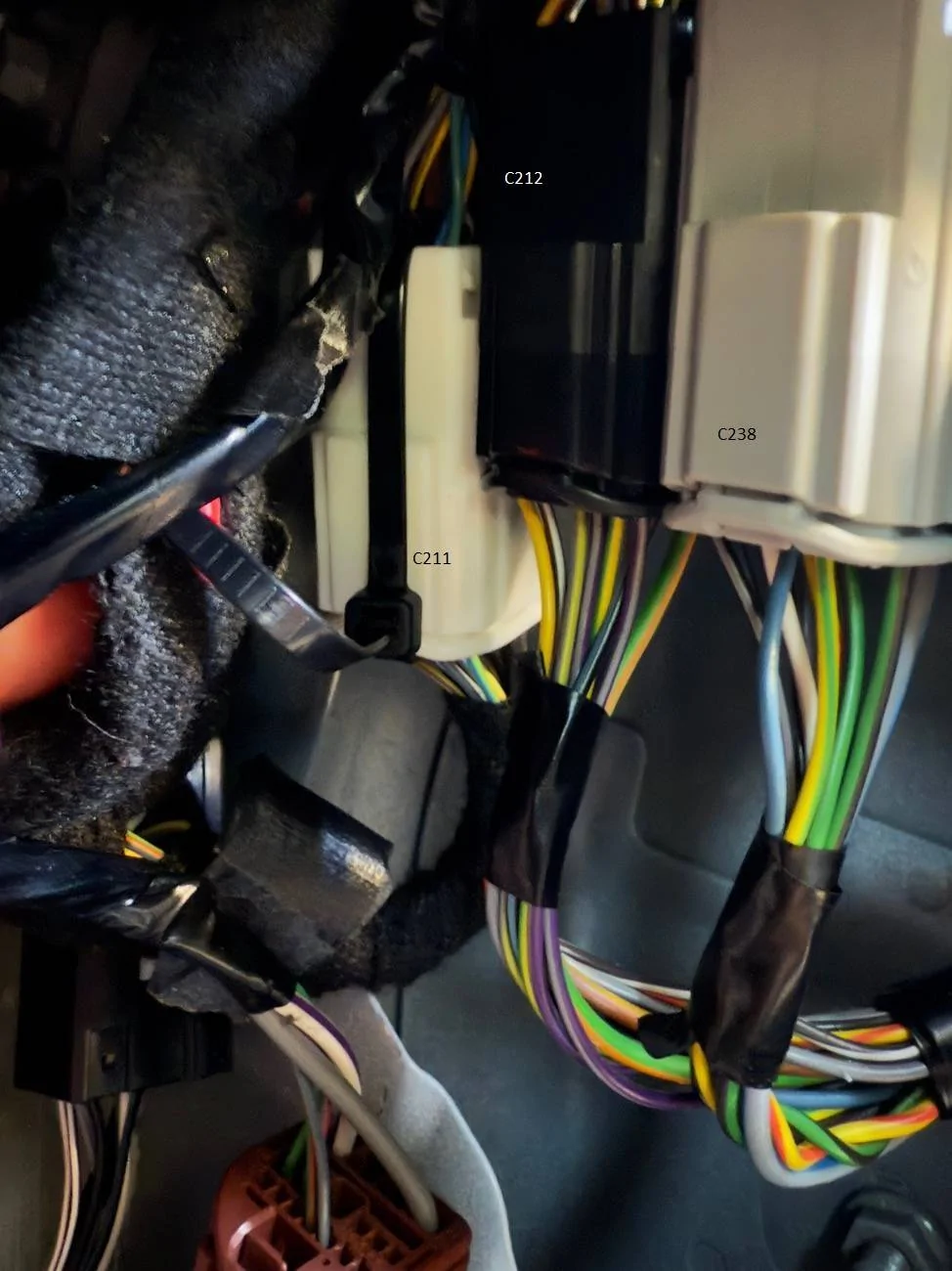 RH Kick Panel Con C211 Ziptied.jpeg
