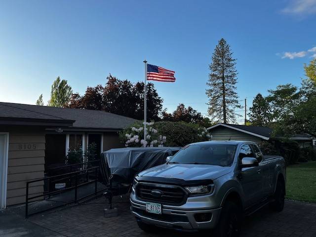 Lucille and new flag pole.jpg