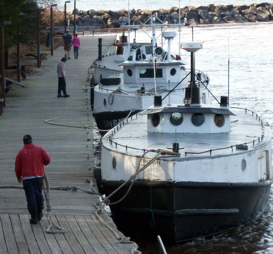 Black river fishing boat parked (DL).jpg