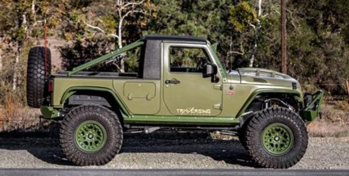 Green Iguana 2014 Jeep Wrangler Sport Truck Conversion.jpg