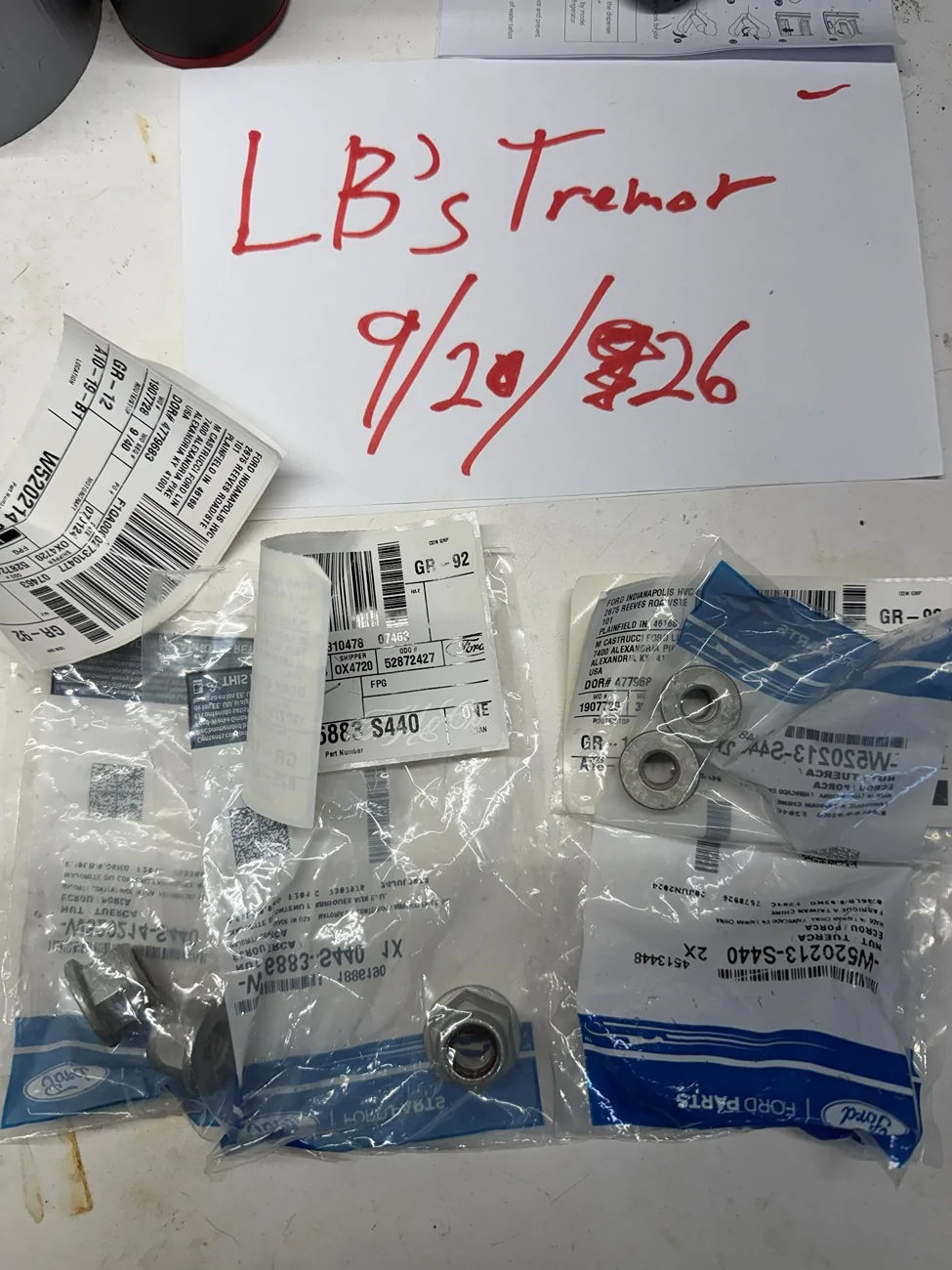 OEM strut nuts and tie rod end nuts.webp
