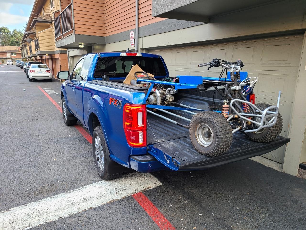 hauling the quad.jpg
