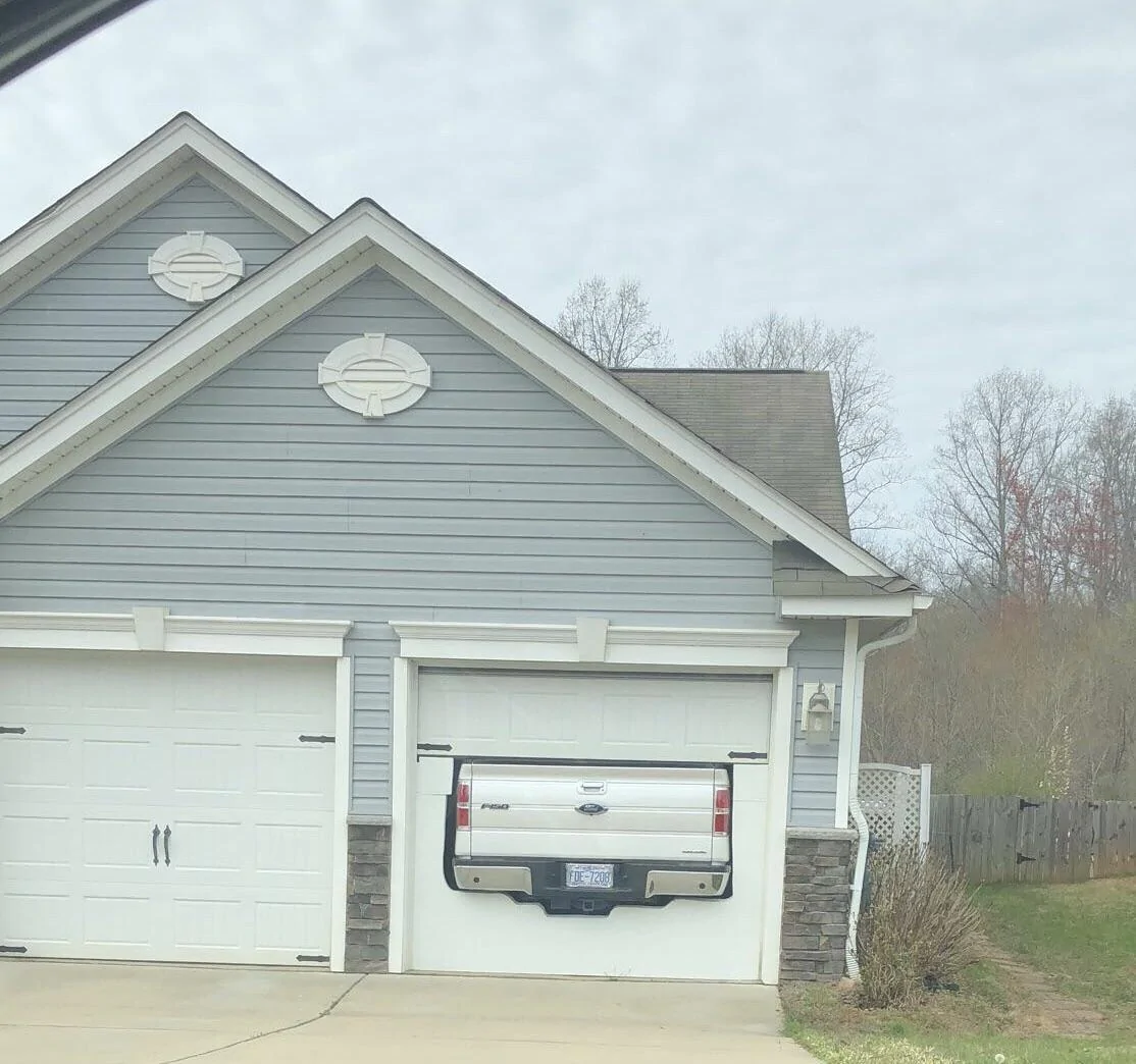 garage-door-cut-to-fit-truck-funny.webp