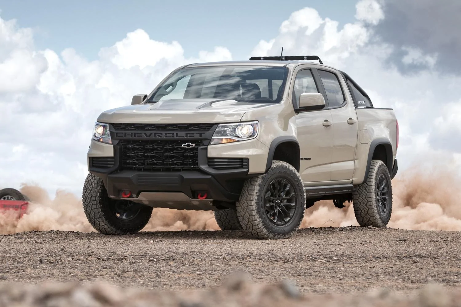 2021-Chevrolet-Colorado-ZR2-Exterior-006-front-three-quarters-on-gravel.webp