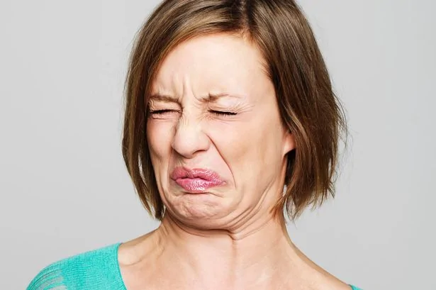 Young-woman-pulling-disgusted-face.jpg