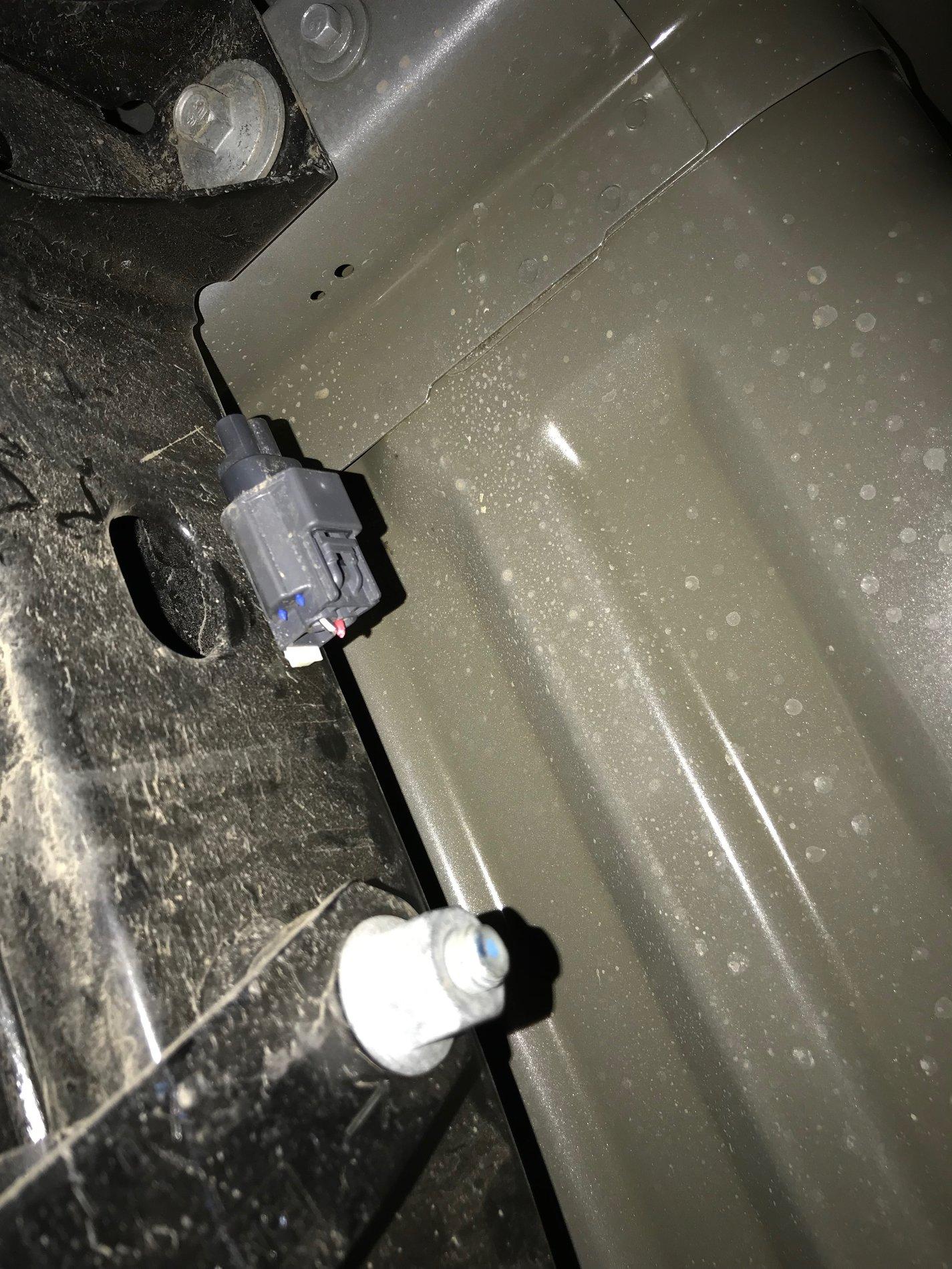 CUT 12V bed outlet wires and used as power source on inside of frame rail now.JPG